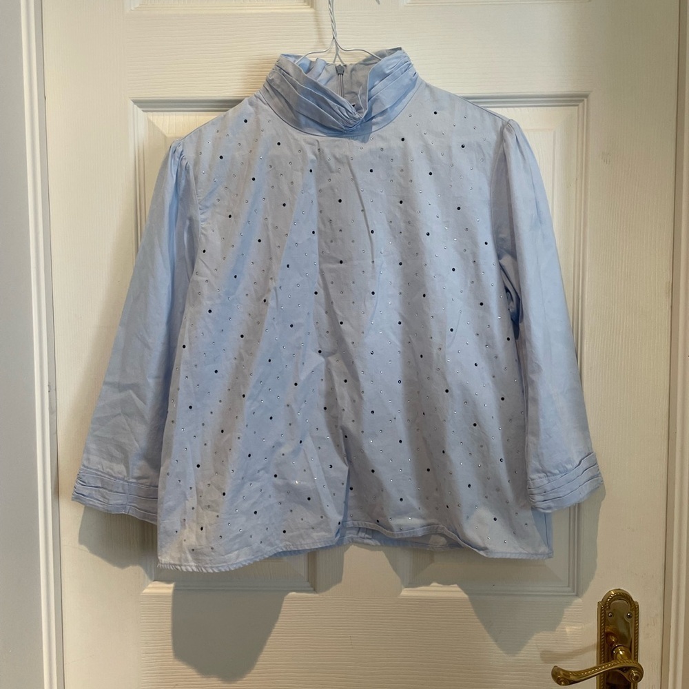 Woman’s blue blouse Zara
